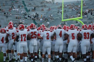 The Youngstown State football team huddles together before its battle with Michigan State on Sept. 2, 2011. The Penguins will return to Spartan Stadium on Saturday for another game with the Spartans. Jambar file photo. 