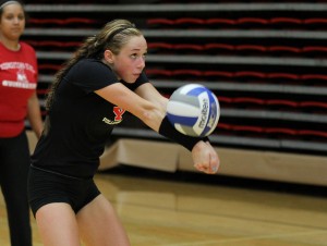 Freshman defensive specialist Dana Borsz bumps the ball during practice on August 9. The Penguins are looking to improve on last season's 15-14 record.  Photo by Dustin Livesay/The Jambar.