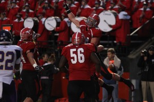 Youngstown State's Nate Adams (44) celebrates while being lifted in the air by Chris Elkins (66) after diving for a touchdown pass during the fourth quarter of Saturday nights matchup against Western Illinois University.  Photo by Dustin Livesay  |  The Jambar
