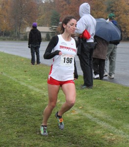 Anna Pompeo runs during Saturday's Horizon League championships in Boardman. The YSU women's cross country team won their first title, while the men's team finished second. Photo courtesy of YSU sports information.