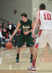 Ryan Strollo of Ursuline takes the ball up the court against Peyton Aldridge of LaBrae in the Hope Foundation of the Mahoning Valley’s 2012 Hope Classic: High School Basketball Showcase. Photo Courtesy of Tony Spano.