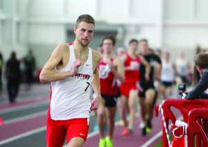Youngstown State University’s Eric Rupe competes in the one mile run during Saturday’s YSU National Invitational. Rupe won the event while teammate Austin McLean finished behind him. 