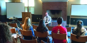 Youngstown Mayor John McNally speaks to a crowd of scholars and honors students during an event at the Cafaro House dormitiories on April 1.