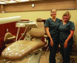 Senior dental hygiene majors Nichelle Bilotto and Cynthia Zatroch are two of the many dental students conducting free teeth cleanings. New clinical labs in Cushwa Hall will soon be available to dental students and patients alike. 