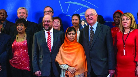 Malala Yousafzai, who was awarded the Nobel Peace Prize, stands with family members after being presented with the 25th Sakharov Prize for Freedom of Thought by the European Parliament in 2013. Photo courtesy of Claude TRUONG-NGOC/Wikimedia Commons.