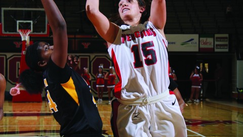 Heidi Schlegel (15) attempts a shot during last season’s opener against Virginia Commonwealth University. Schlegel finished second on the team in scoring with 31.6 points per game.Photo courtesy of YSU sports information.