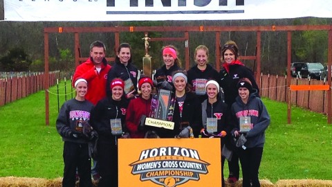 The Youngstown State University women’s cross country team poses for a picture after being named Horizon League Champions on Nov. 1. The Penguins have been named the conference champions in back-to-back season for the first time in program history. Photo courtesy of Sports information.
