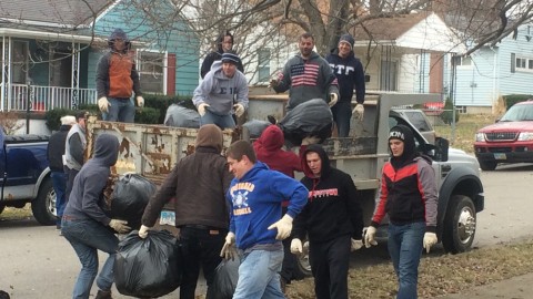 Members of the YSU Chapter of Sigma Tau Gamma help to clean neighborhoods in Youngstown through the Youngstown Neighborhood Development Corporation. Photo courtesy of Brandon O'Neill. 
