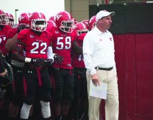 Bo Pelini, head coach of the Youngstown State University football team, picked up his first Missouri Valley Football Conference victory after the Penguins defeated the University of South Dakota 31-3 on Saturday in the Dakota Dome.