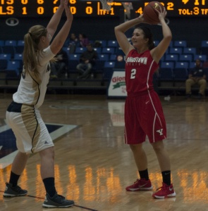 Youngstown State University guard Alison Smolinski looks to pass the ball in Monday night's loss to the University of Akron.