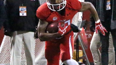 Youngstown State University running back Jody Webb makes a cut toward the middle of the field.