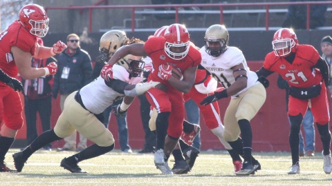 Youngstown State University running back Tevin McCaster breaks a tackle during YSU's 30-23 win over Wofford College in the quarterfinals.