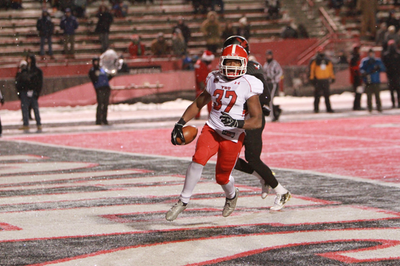 YSU running back looks into the camera after scoring on a 4-yard touchdown in YSU's eventual win